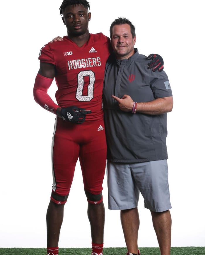 Indiana commit Shamar Meikle with outside linebackers coach Kasey Teegardin during an official visit in June.